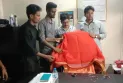 প্রক্টর-ছাত্র উপদেষ্টাকে প্রতীকী শাড়ি চুড়ি পরিয়ে দিলেন শিক্ষার্থীরা