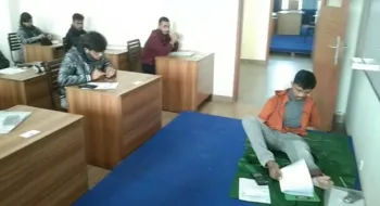 পা দিয়ে লিখে এভিয়েশন অ্যান্ড অ্যারোস্পেস বিশ্ববিদ্যালয়ে ভর্তি পরীক্ষা দিল রফিকুল