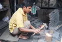 কোরবানির ঈদকে সামনে রেখে টুংটাং শব্দে মুখরিত রংপুরের কামারপাড়া