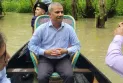 নৌকায় চড়ে রাতারগুল ঘুরলেন আসিফ নজরুল, শুনলেন মাঝিদের গান